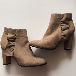 Suede tan booties with ruffle on side.